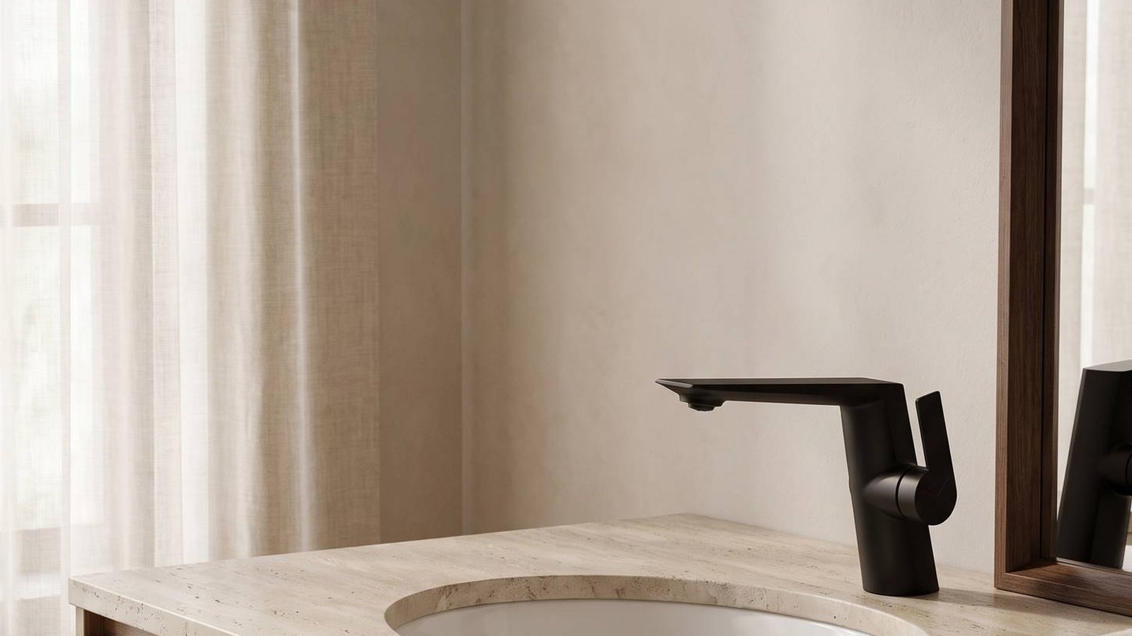 Kissinger single hole bathroom faucet in matte black on a travertine vanity with natural window light