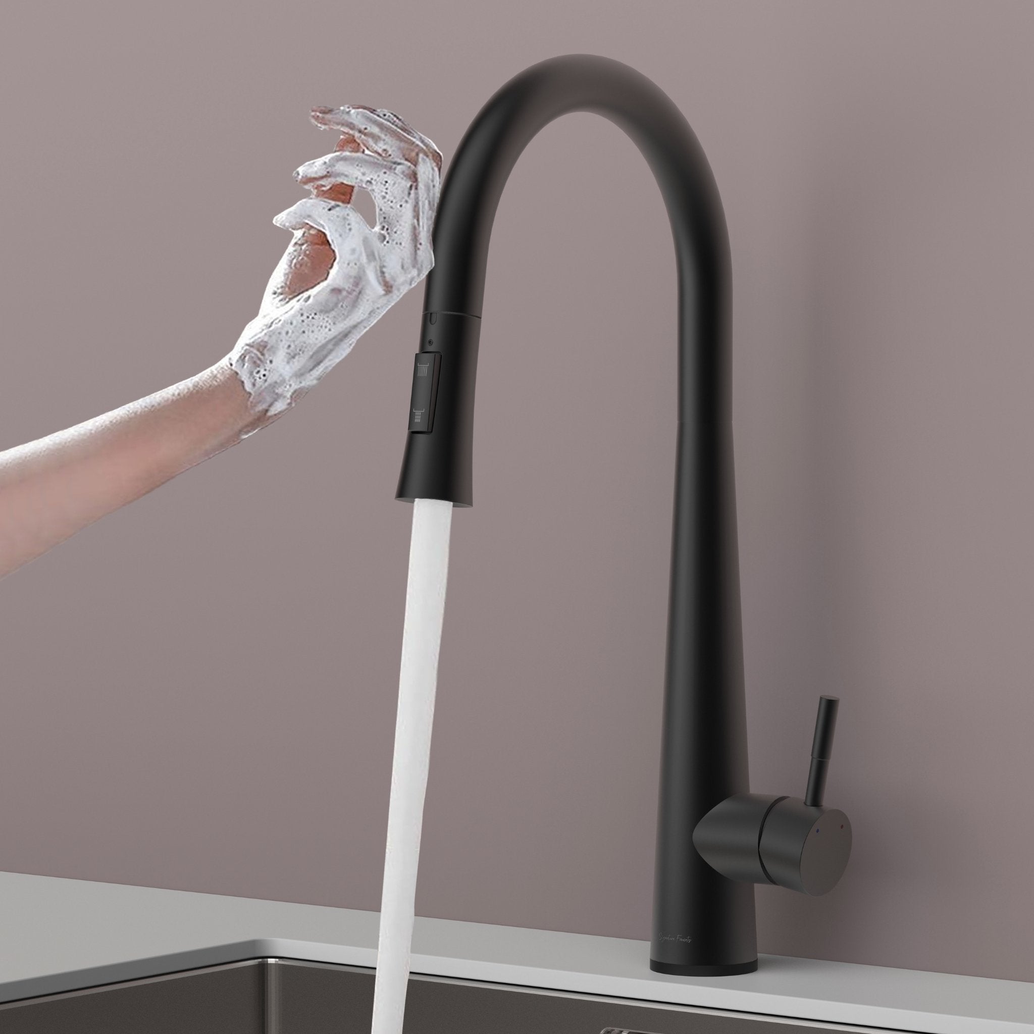 Matte black touch kitchen faucet activated by a soapy hand with water flowing #color_matte black