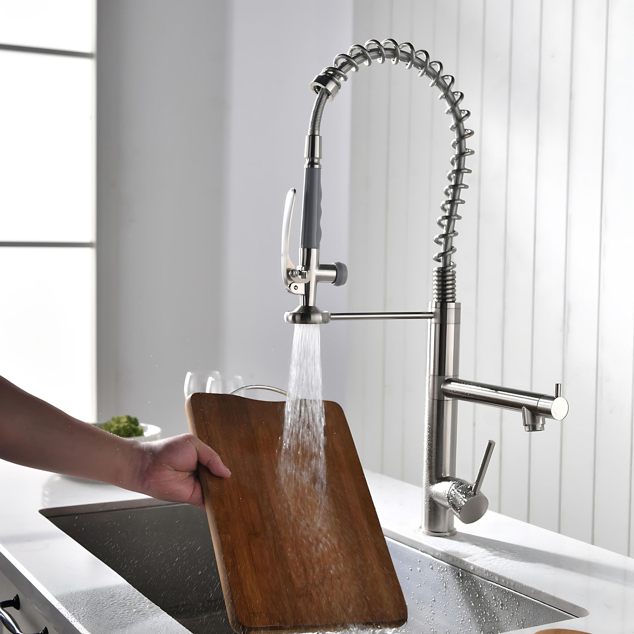Brushed Nickel commercial kitchen faucet, pull-down spray head rinsing cutting board #color_brushed nickel