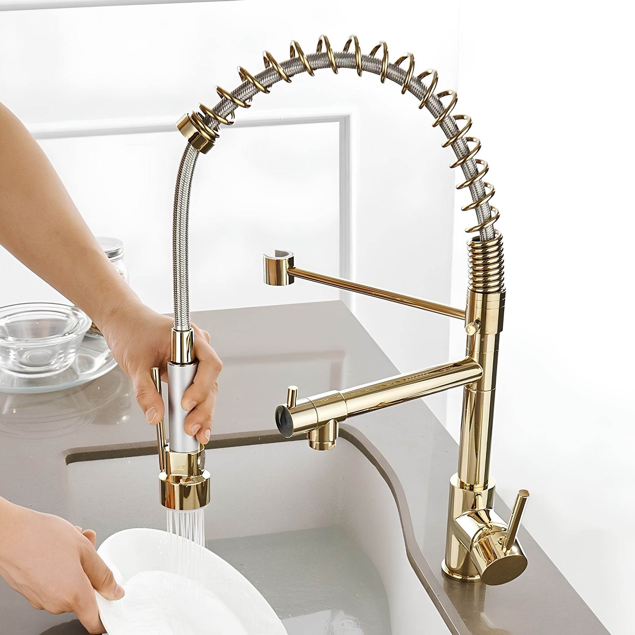gold pull-down kitchen faucet plate raising under the pulled-down spray #color_gold