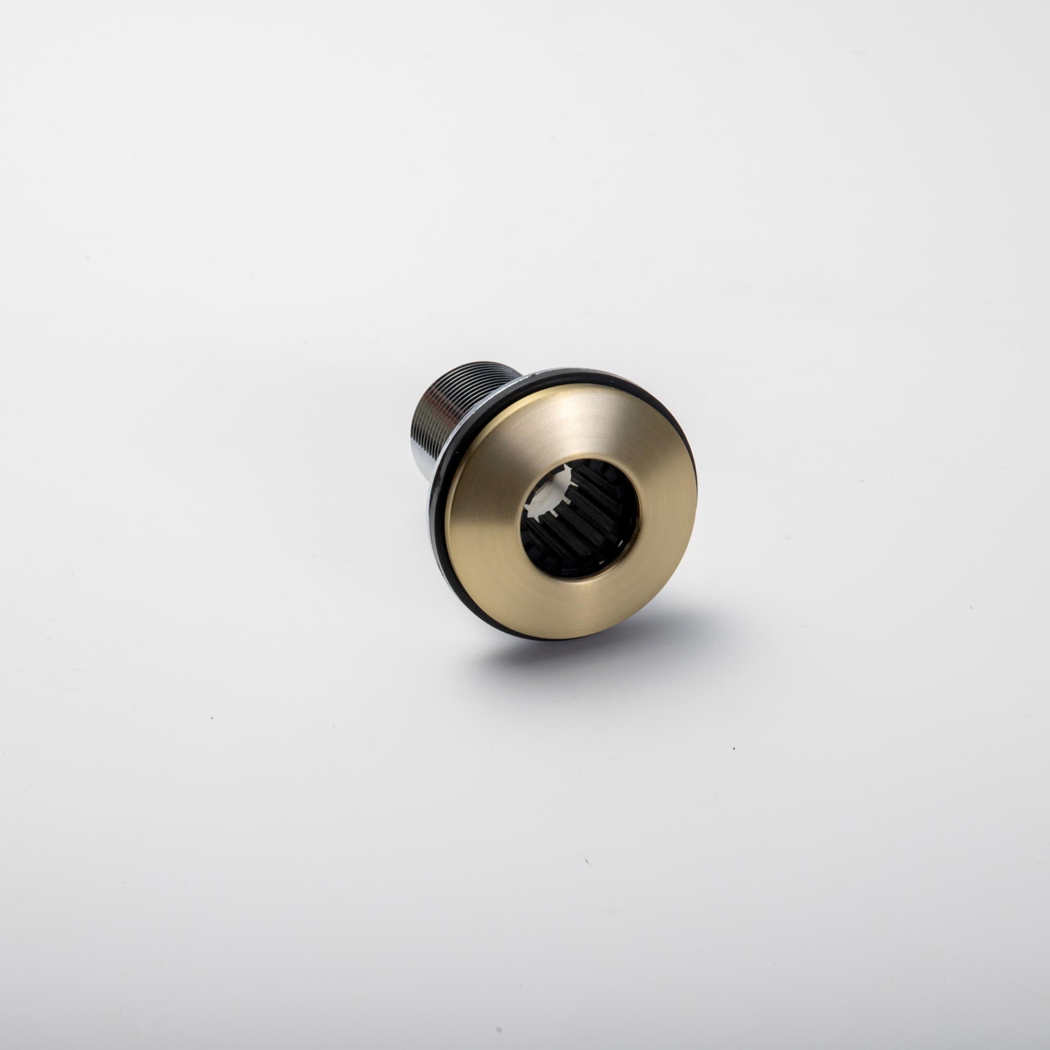 Close-up view of the underside mounting mechanism of the Berg Soap Dispenser.