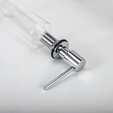 A stainless steel kitchen sink soap dispenser with a clear container and a chrome finish