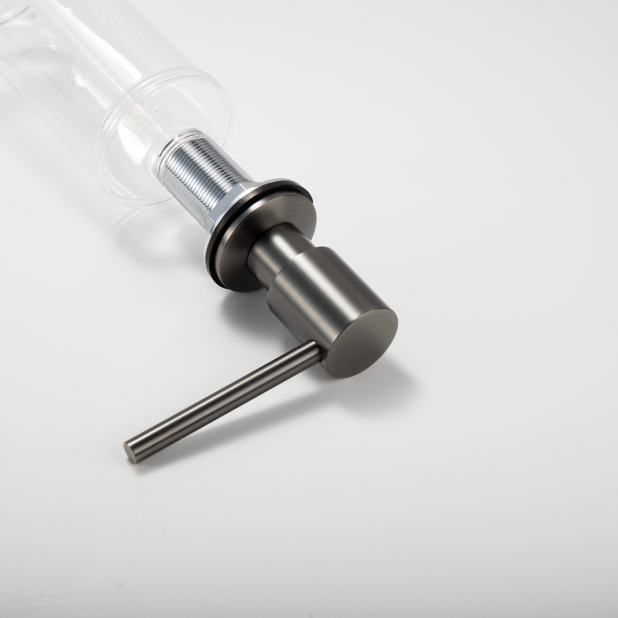 Angled view of the Berg Kitchen Sink Soap Dispenser in Gunmetal Gray, showing the spout and mounting base.