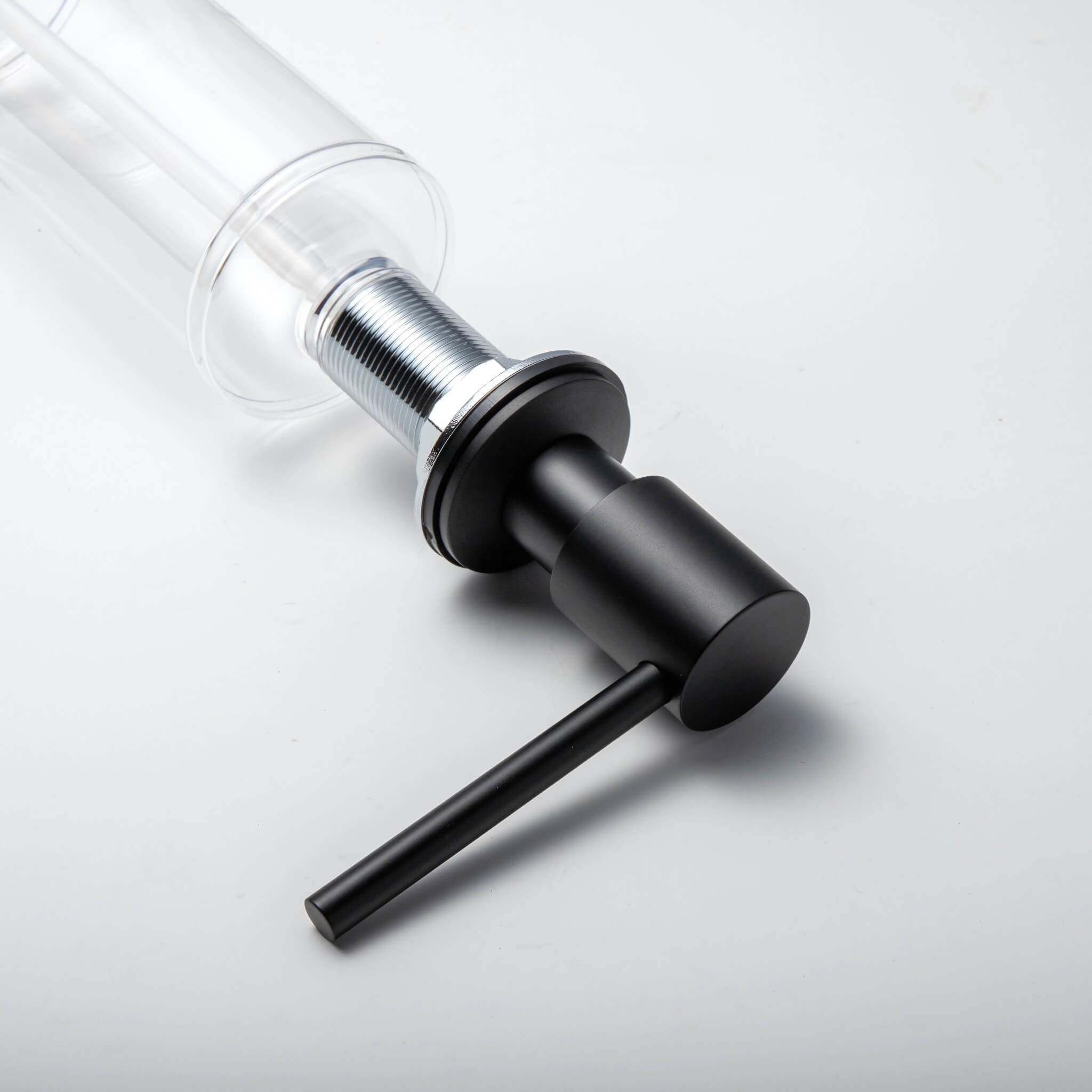 Matte black stainless steel soap dispenser with clear pump on white background