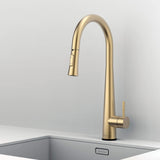 Side view of Arcus Touch Kitchen Faucet with Pull-Down Sprayer in elegant brushed gold finish, showcasing modern minimalist design by Signature Faucets. #color_brushed gold