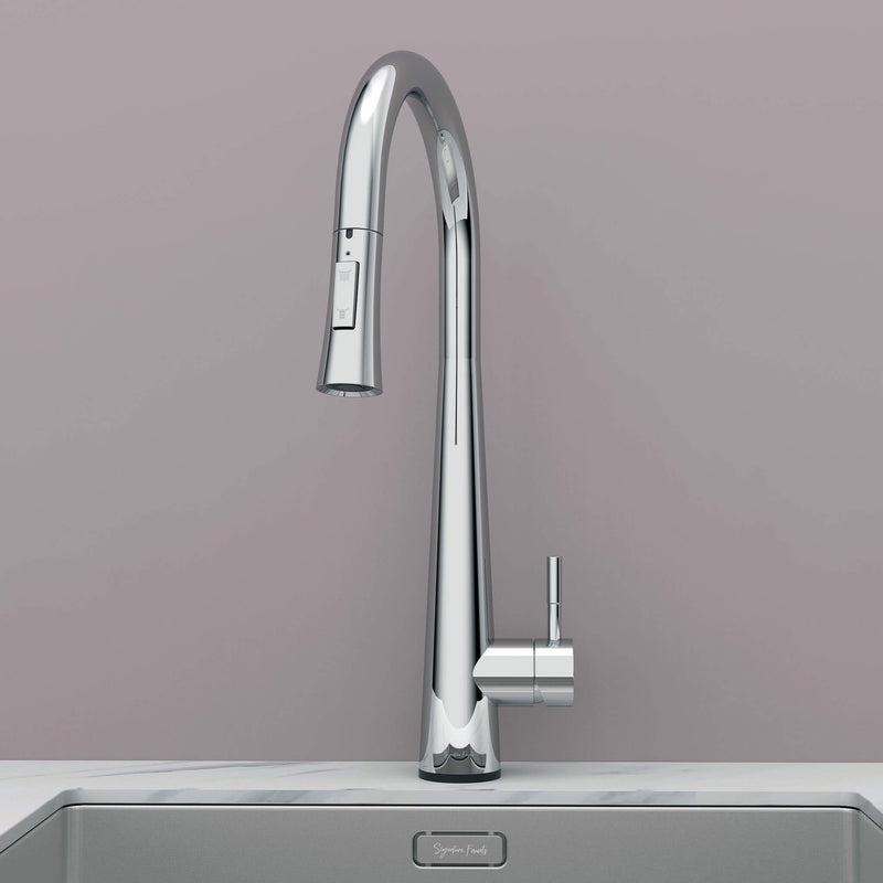 Front view of Arcus Touch Kitchen Faucet with Pull-Down Sprayer in chrome finish, installed on stainless steel sink by Signature Faucets. #color_chrome