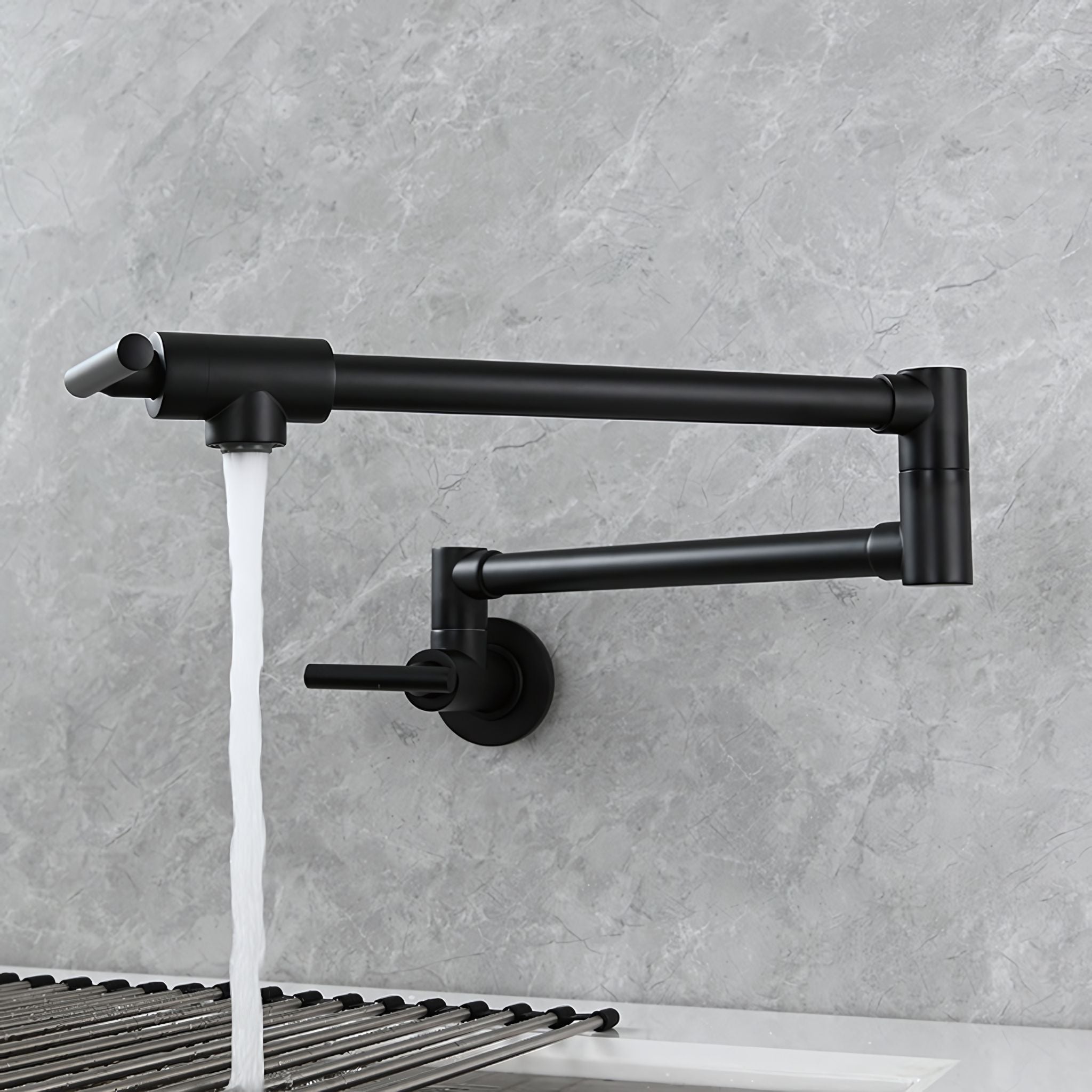 Black kitchen faucet with water flowing against a gray tiled wall. #color_matte black