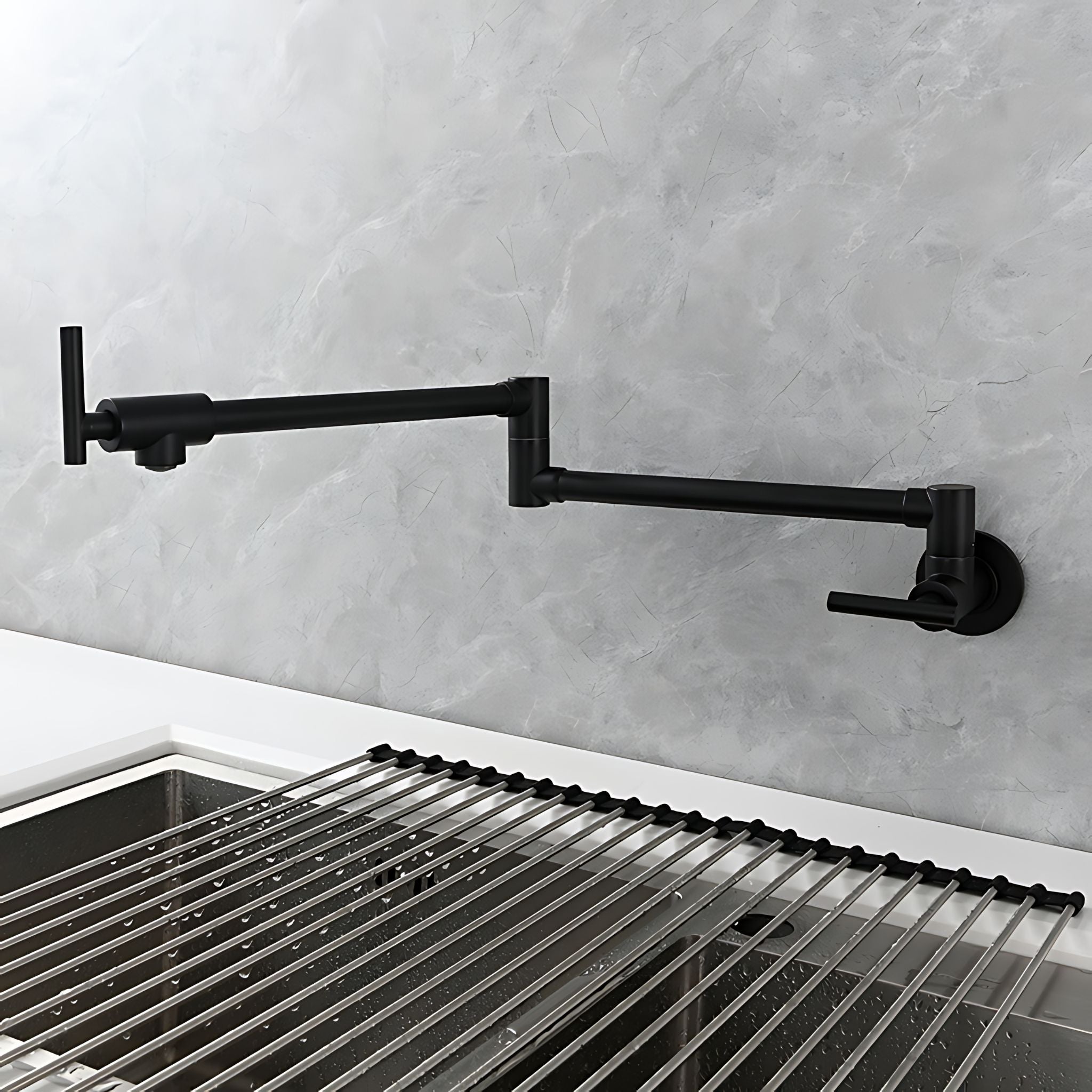 A matte black wall-mounted kitchen sink faucet with an adjustable arm and side lever, shown installed above a stainless steel sink with a wire rack against a light gray marble-look backsplash. #color_matte black