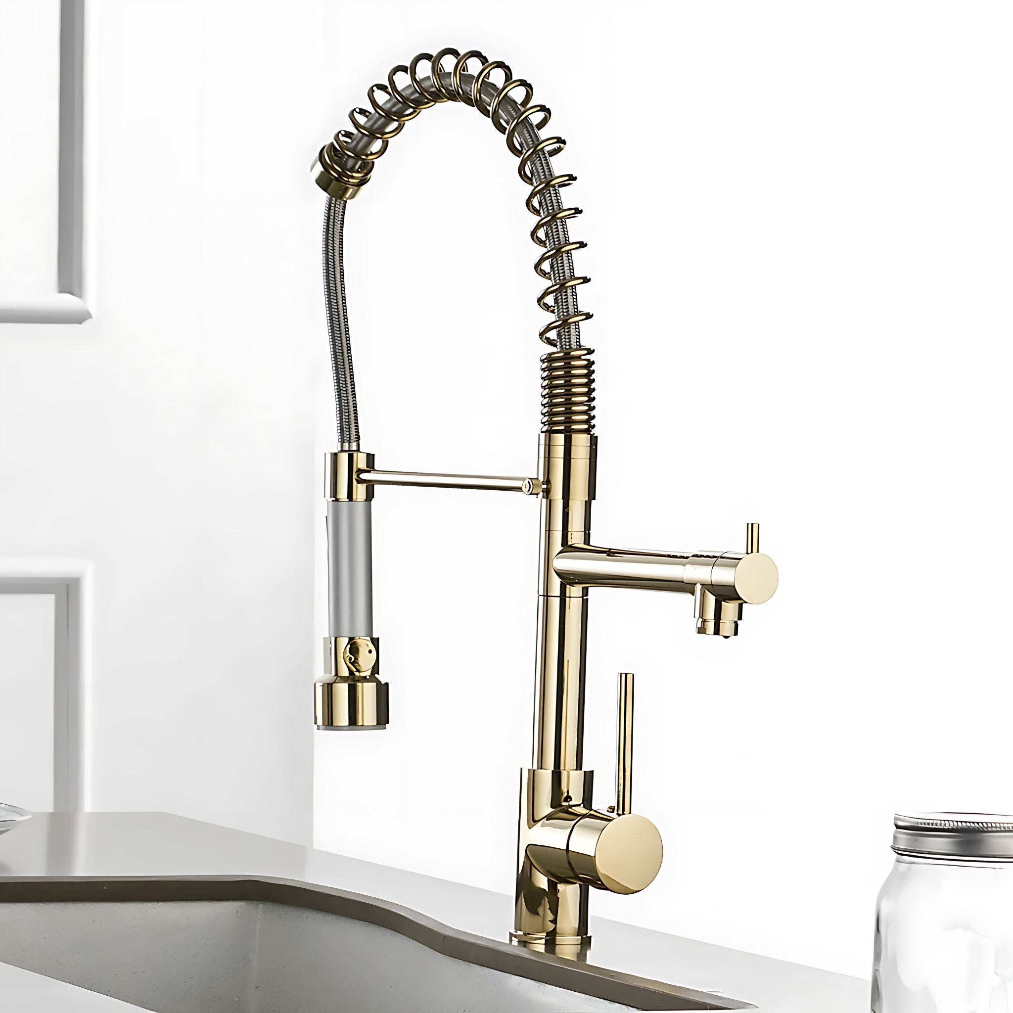 Gold pull-down kitchen faucet with spring hose extended showing flexible reach range #color_gold
