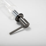 Angled view of the Berg Kitchen Sink Soap Dispenser in Gunmetal Gray, showing the spout and mounting base.