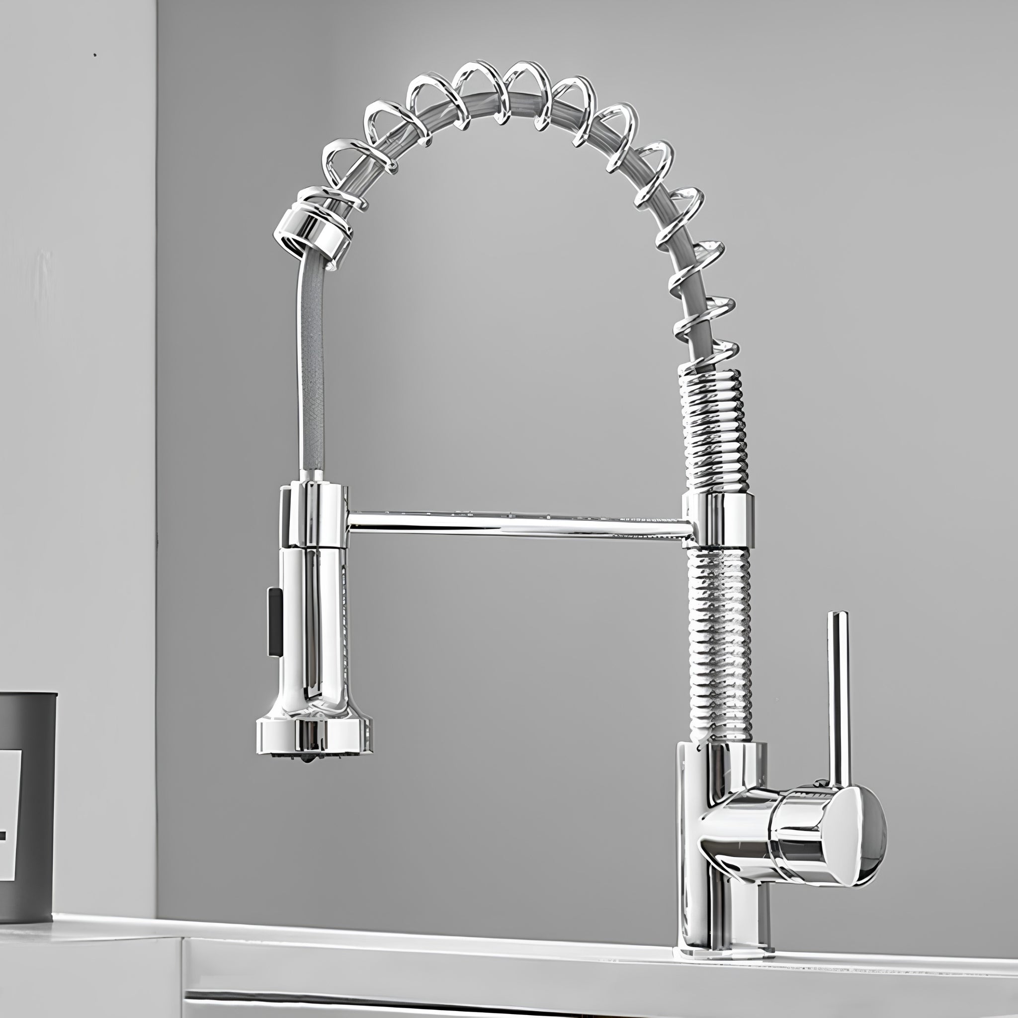 Spiro v2.0 chrome spring spout kitchen faucet installed on a countertop, side view #color_chrome