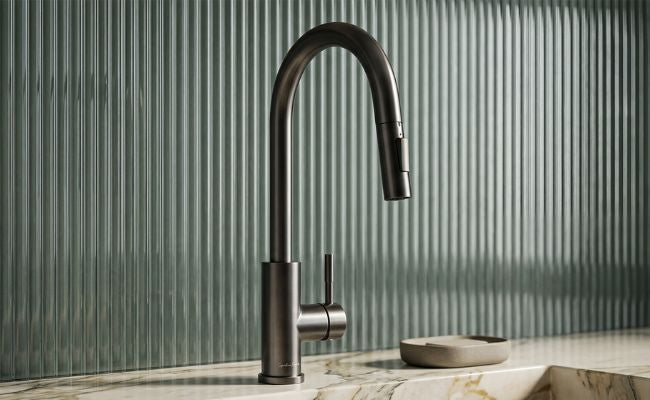 Imperium touch kitchen faucet in gunmetal grey with pull-out sprayer and modern high-arc design on marble countertop